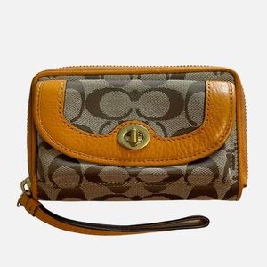 Coach Signature Turn Lock Wristlet in Tan and Orange EUC
